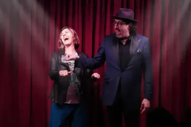 Guest laughing during interactive magic show